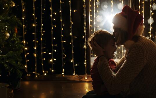 Mother and son enjoy in Christmas night