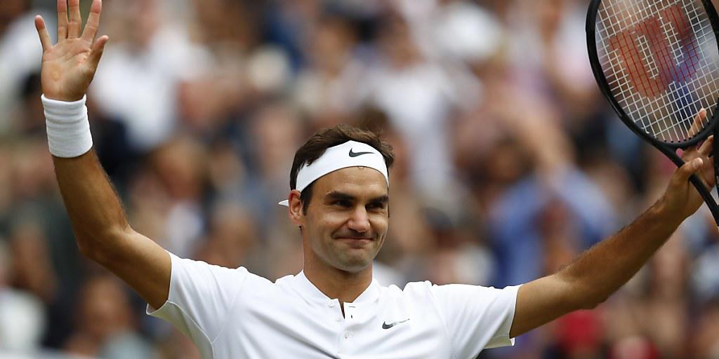Roger Federer bejubelt in Wimbledon seinen Finaleinzug Roger Federer bejubelt in Wimbledon seinen Finaleinzug