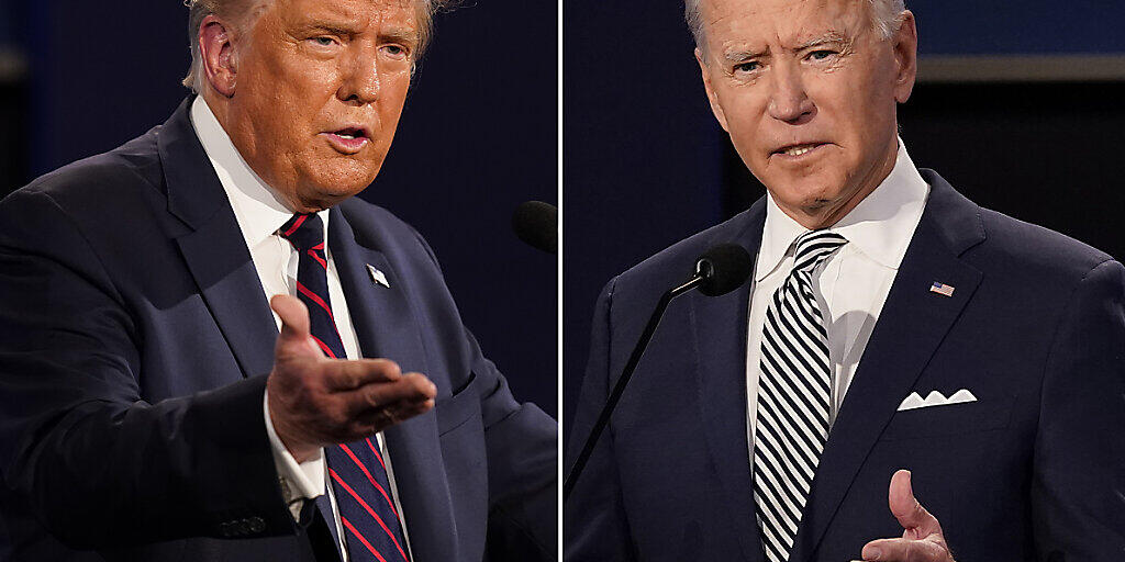 ARCHIV - Die Bildkombo zeigt Präsident Trump (l) und den ehemaligen Vizepräsidenten Joe Biden während der ersten Präsidentschaftsdebatte im September an der Case Western University und der Cleveland Clinic in Cleveland, Ohio. Foto: Patrick Semansky/AP/dpa