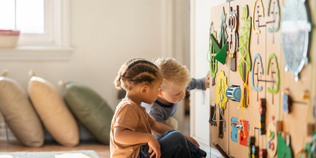 Nursery school friends learning togethehr