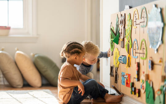 Nursery school friends learning togethehr