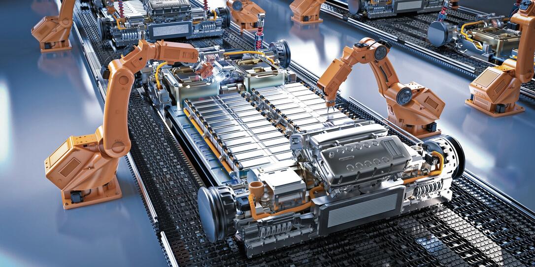 Robot assembly line with electric car battery cells module on platform Robot assembly line with electric car battery cells module on platform
