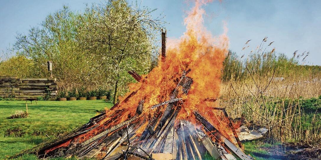 Easter fire on a meadow in spring time
