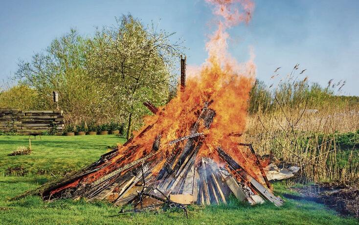 Easter fire on a meadow in spring time