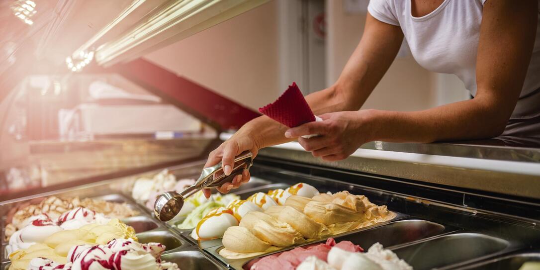 Woman serving ice cream