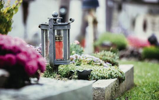 Candle / lantern at the cemetery, funeral, sorrow
