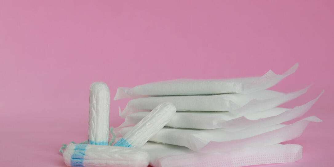 Menstrual pads and tampons on pink background Menstrual pads and tampons on pink background