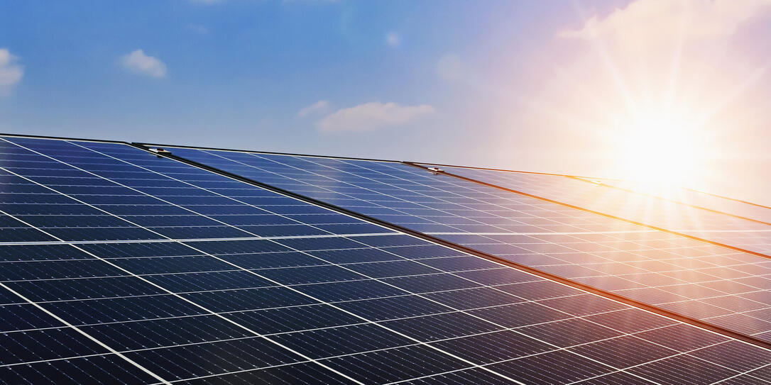 Solar panels with sunset and blue sky background. Clean power energy concept Solar panels with sunset and blue sky background. Clean power energy concept