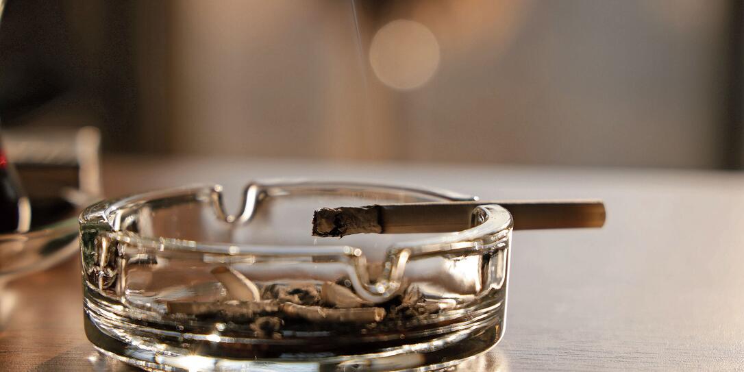 Cigarette in the ashtray