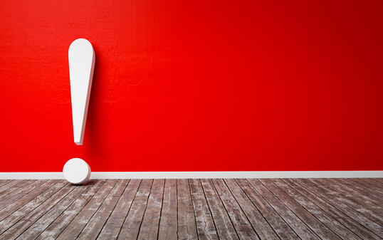 White exclamation mark on wooden floor and concrete wall 3D Illustration Warning Concept