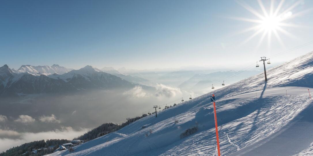 beautiful winter day in a ski resort in the Alps