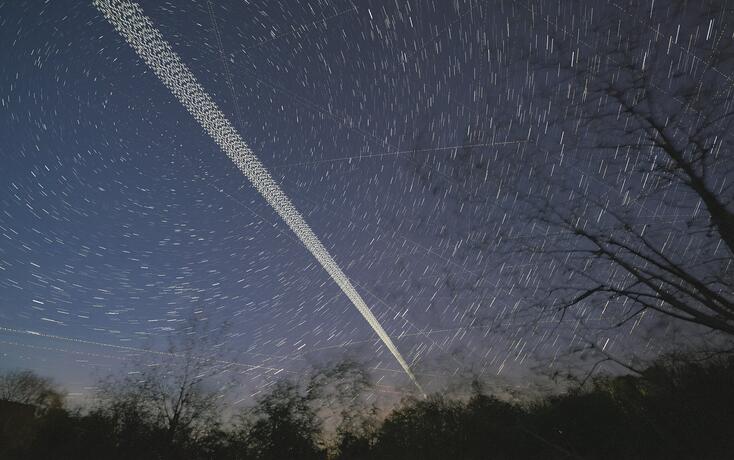 Starlink satellites in the night sky over Austria