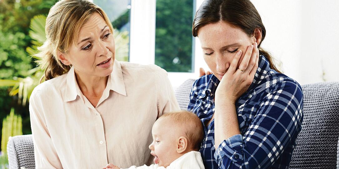 Health Visitor With New Mother Suffering With Depression