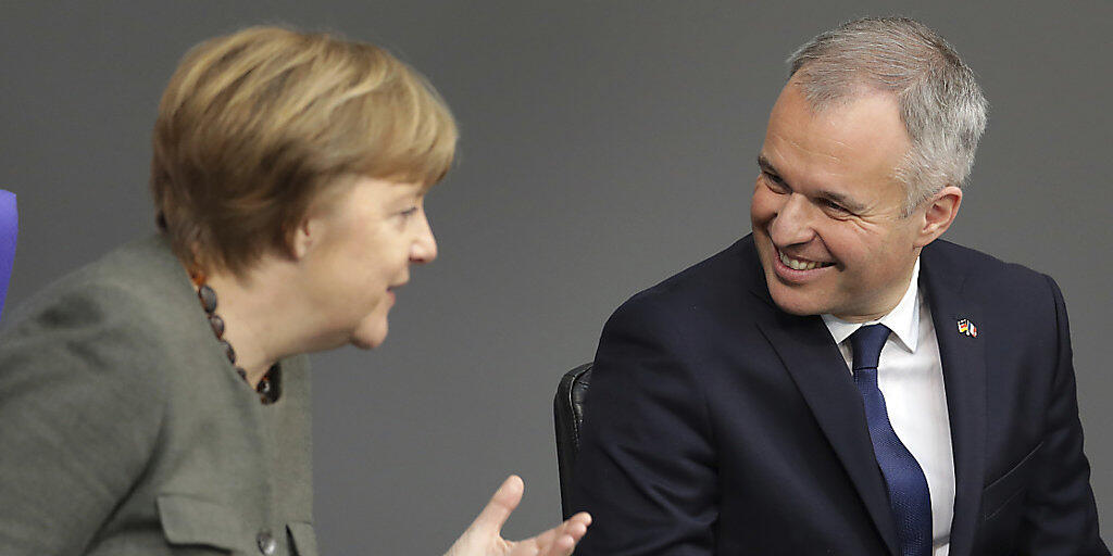 Die deutsche Bundeskanzlerin Angela Merkel und der französische Parlamentspräsident François de Rugy anlässlich der Feier zum 55. Jubiläum des Elysée-Vertrags im Reichstag in Berlin.
