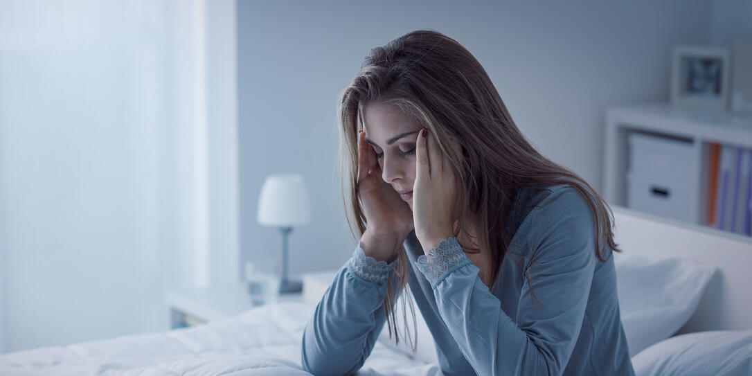 Depressed woman awake in the night