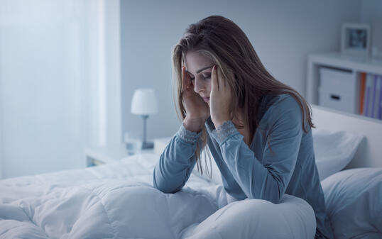 Depressed woman awake in the night