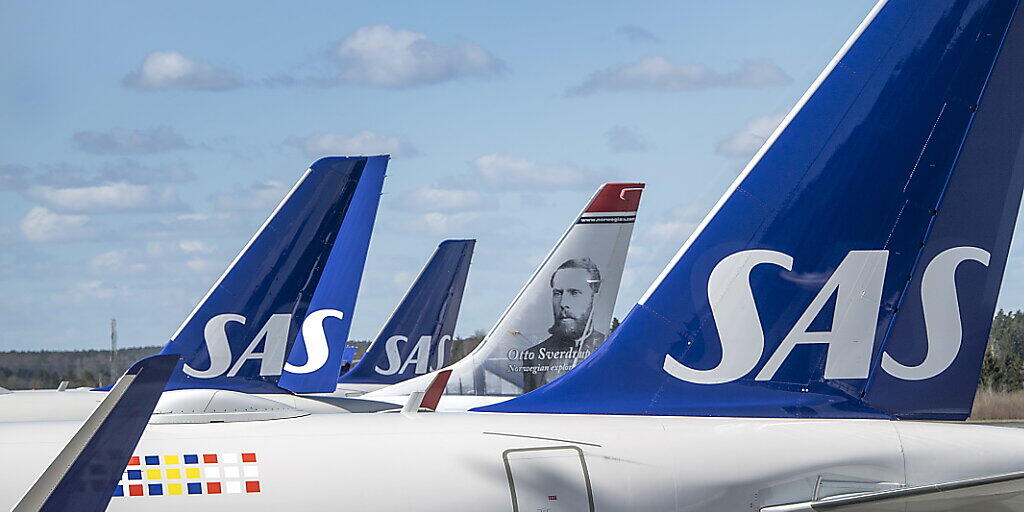 Flugzeuge der Scandinavian Airlines System (SAS) Gruppe in Stockholm (Archivbild). Flugzeuge der Scandinavian Airlines System (SAS) Gruppe in Stockholm (Archivbild).