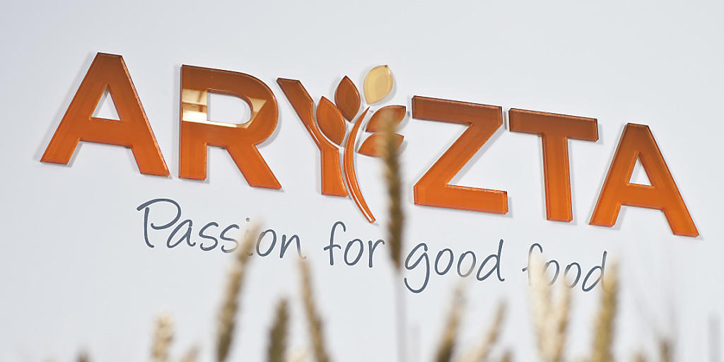 Das Wachstum spriesst nicht gross ins Kraut: Logo von Aryzta hinter Ähren am Firmensitz in Zürich. (Archiv)