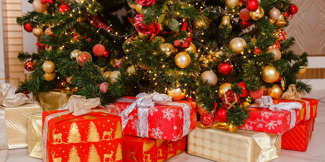 beautiful big elegant Christmas tree with red balls. holiday