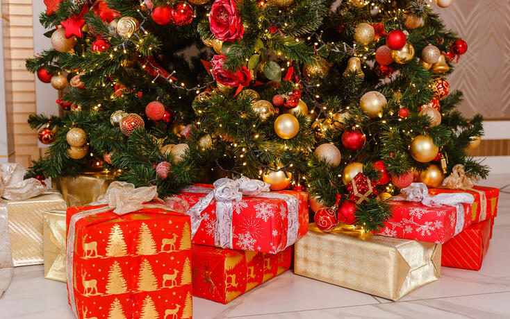 beautiful big elegant Christmas tree with red balls. holiday