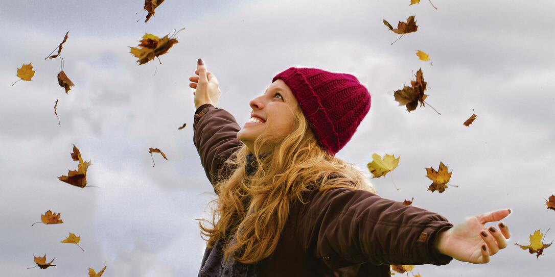 Happy woman in fall