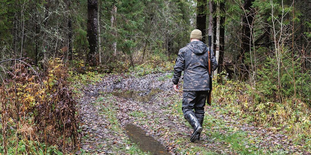 A hunter with a hunting gun
