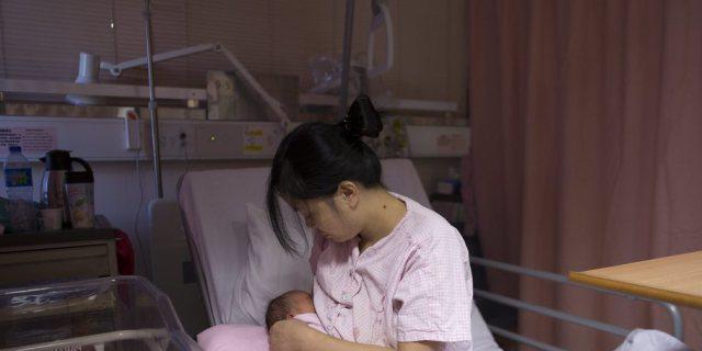 Chinesische Frau mit Kind (Archiv) Chinesische Frau mit Kind (Archiv)