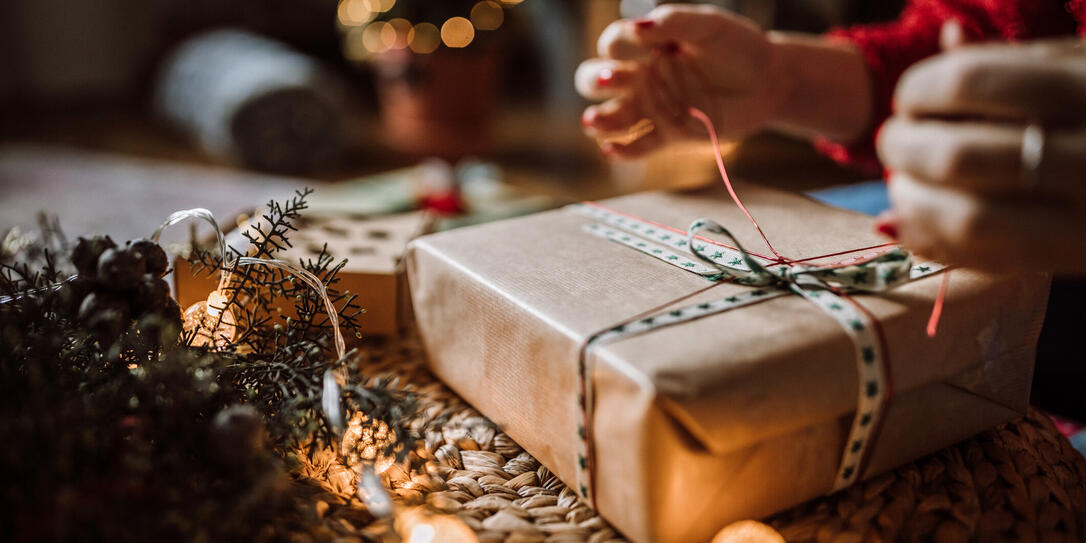 Woman Wrapping Christmas Gifts