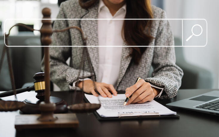 Searching Browsing Internet Data Information Networking Concept with blank search bar.justice and law concept.Male judge in a courtroom with the gavel,working with digital tablet.