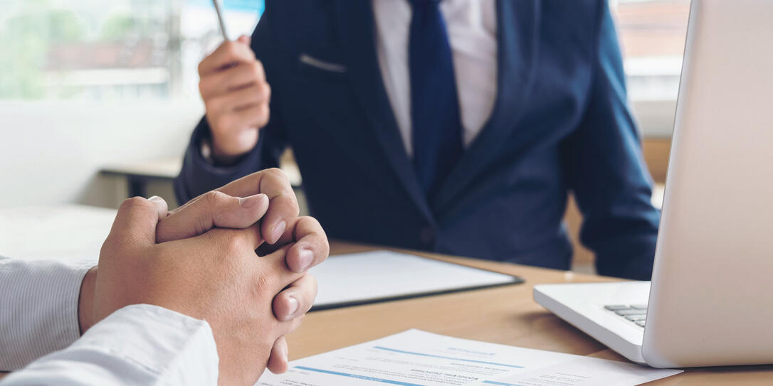 Job application interview. Executive manager hold up pen to Sign Approval, Close up of male hands, man feel worried, stressed, be nervous, Hiring concept