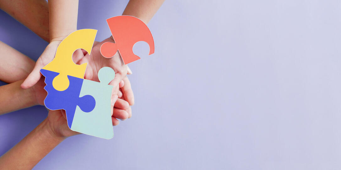 Hands holding jigsaw puzzle head shape, Autism awareness, Autism spectrum disorder (ASD), World Autism Awareness Day
