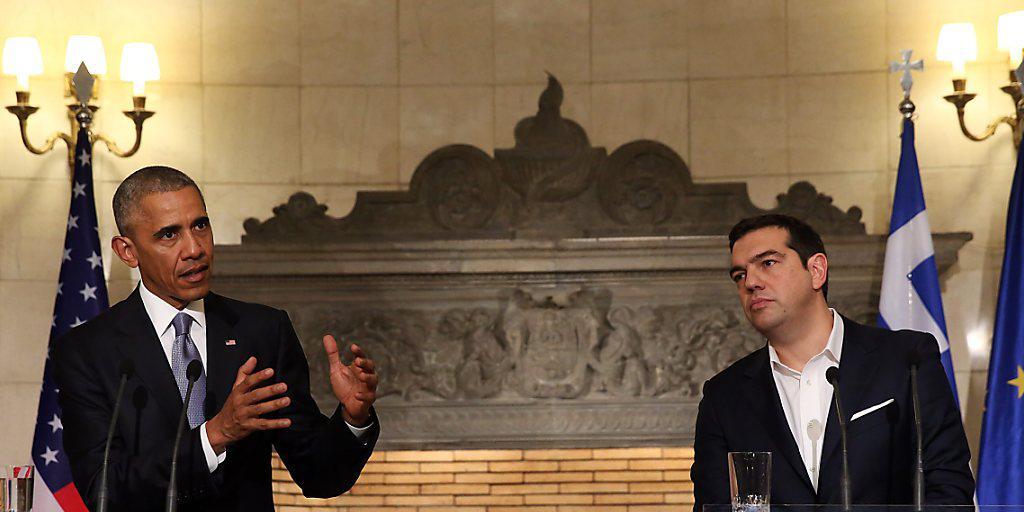 US-Präsident Barack Obama und der griechische Ministerpräsident Alexis Tsipras bei der Pressekonferenz in Athen. US-Präsident Barack Obama und der griechische Ministerpräsident Alexis Tsipras bei der Pressekonferenz in Athen.