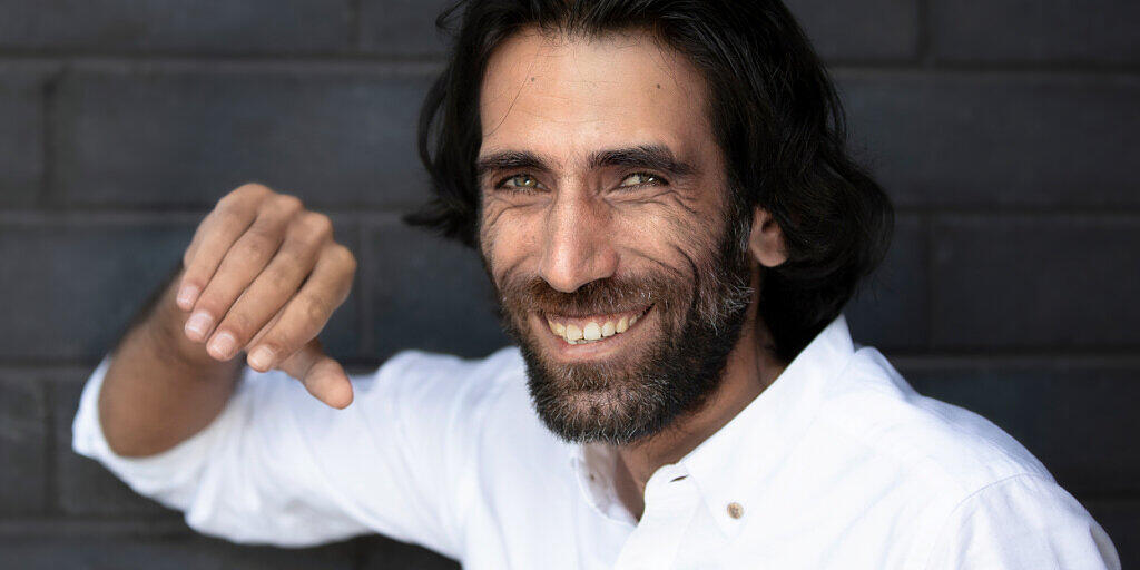 ARCHIV - Der kurdisch-iranische Journalist und Schriftsteller Behrouz Boochani. Foto: Martin Hunter/AAP/dpa
