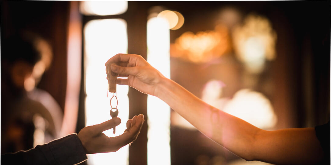 Hotel Receptionist  giving the Room Keys