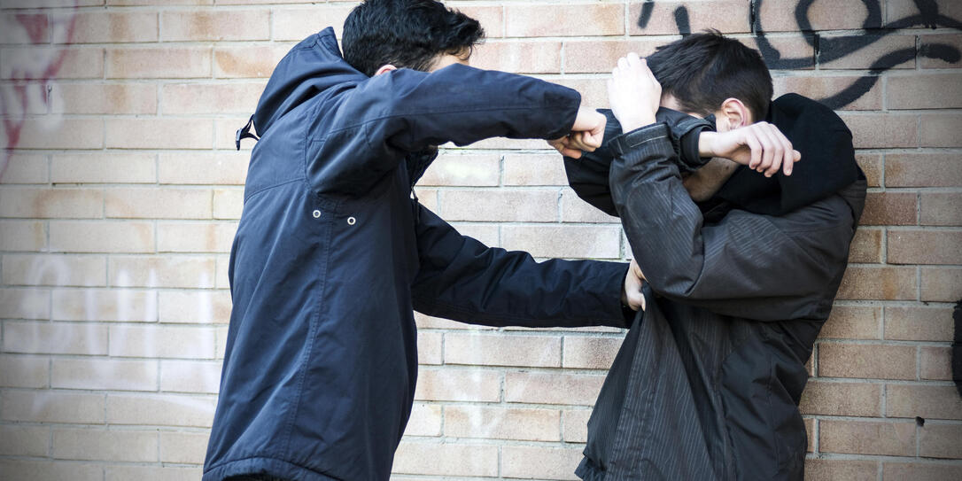 Bullying scene between two adult teenagers