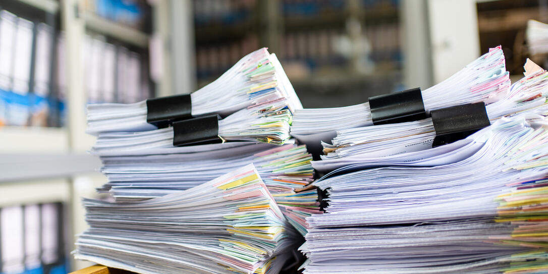 documents achieves paper files for searching information on work desk home office
