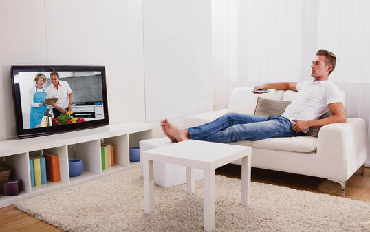 Young Man Watching Television