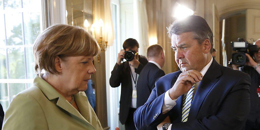 "Derzeit keinen Platz für Russland": Kanzlerin Angela Merkel mit Wirtschaftsminister Sigmar Gabriel "Derzeit keinen Platz für Russland": Kanzlerin Angela Merkel mit Wirtschaftsminister Sigmar Gabriel