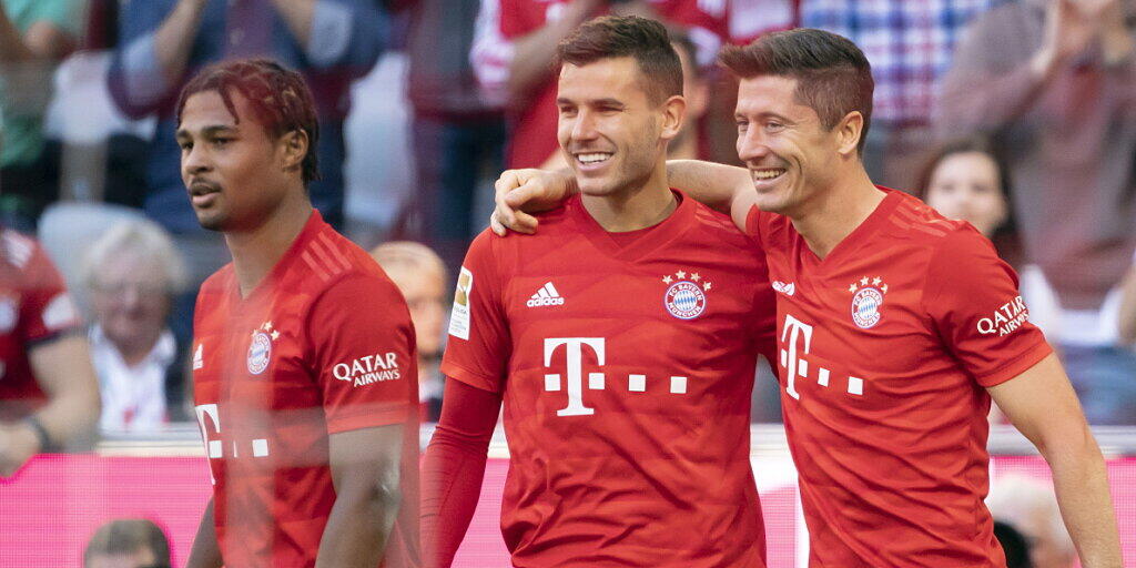 Die selbstverständliche Freude der Bayern (von rechts): Robert Lewandowski, Lucas Hernandez, Serge Gnabry
