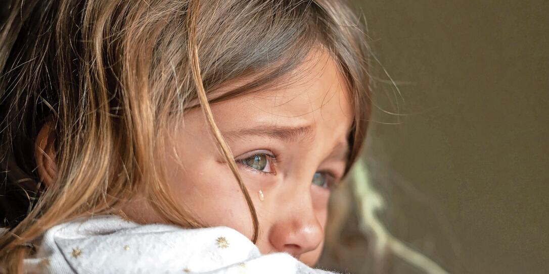 Sad crying little girl
