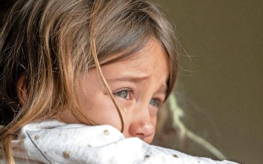 Sad crying little girl