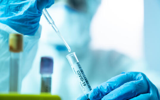 Scientist Woman Working In The CDC Laboratory For Covid-19