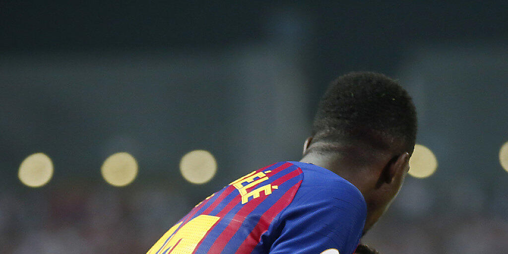 Torschütze Ousmane Dembélé (oben) feiert mit Luis Suarez Barcelonas Siegestor