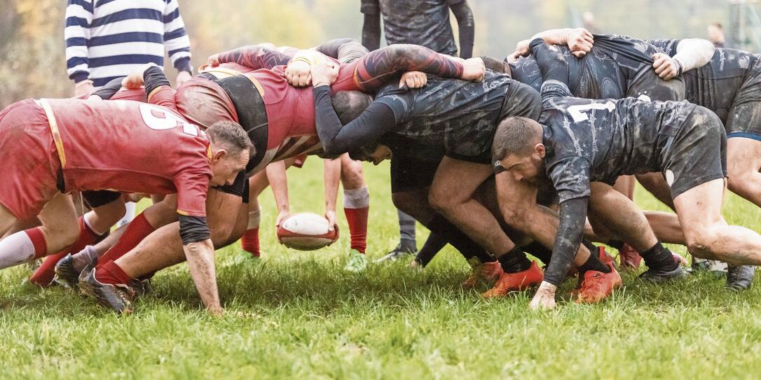 Rugby teams performing scrum