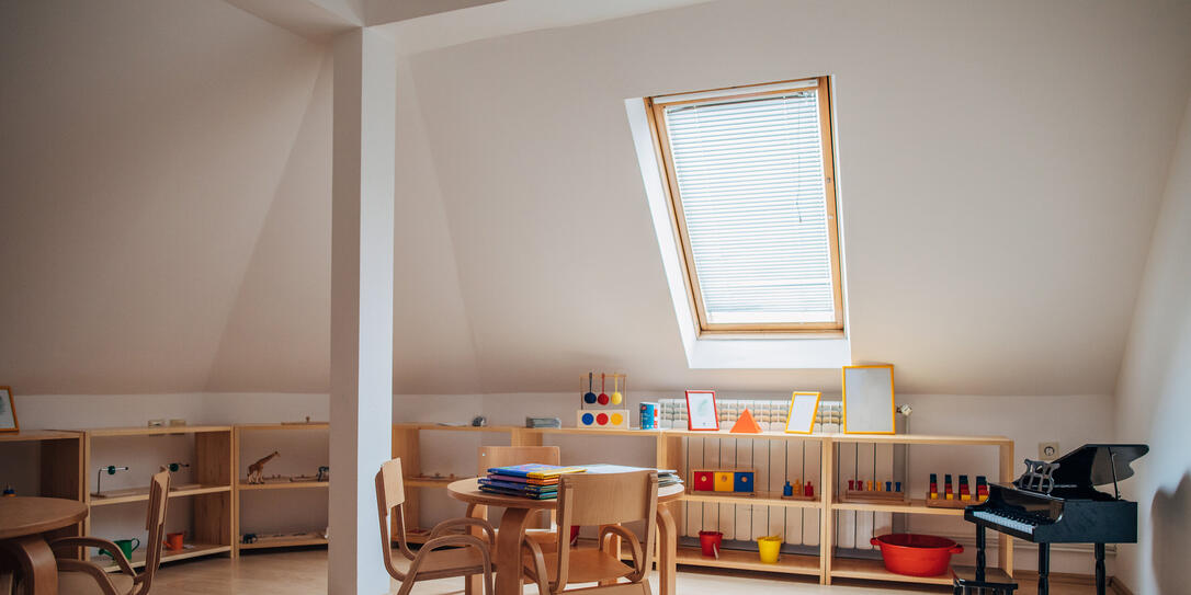 Tables and chairs in modern preschool