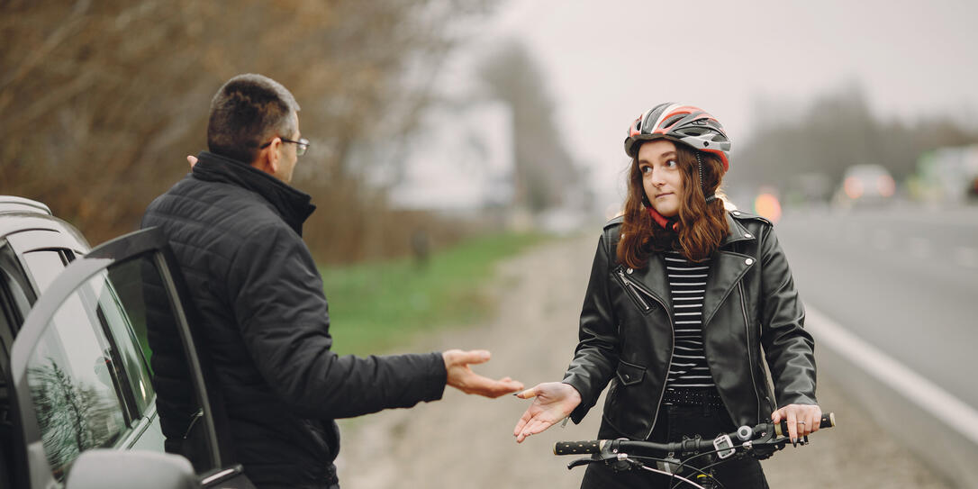 Road accident with cyclist man driver and car