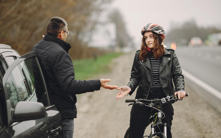 Road accident with cyclist man driver and car