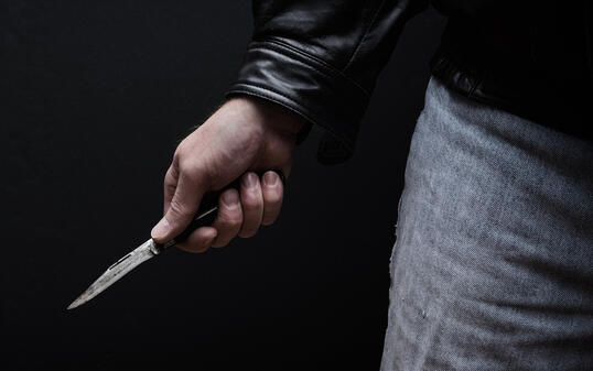 Man Brandishing Knife