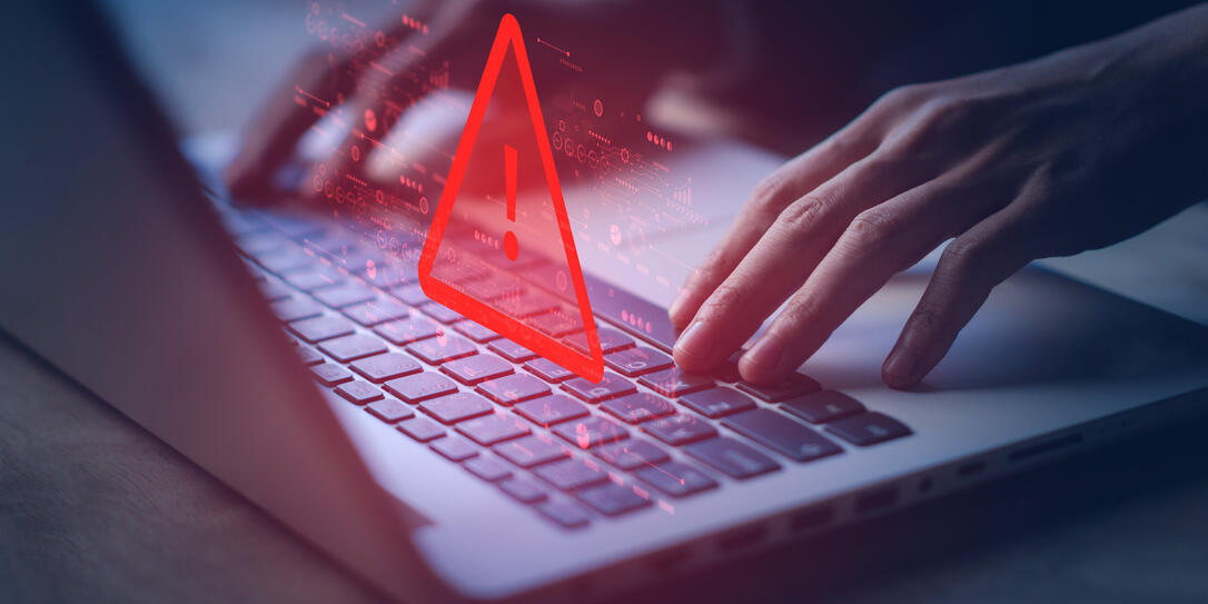 System hacked warning alert on notebook (Laptop). Cyber attack on computer network, Virus, Spyware, Malware or Malicious software. Cyber security and cybercrime. Compromised information internet.