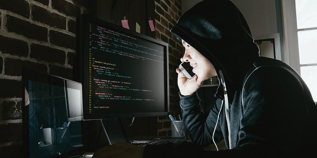 hacker using mobile smartphone calling for victim hacker using mobile smartphone calling for victim